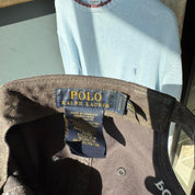Polo Ralph Lauren grey cap with green discolouration and embroidered pony logo.