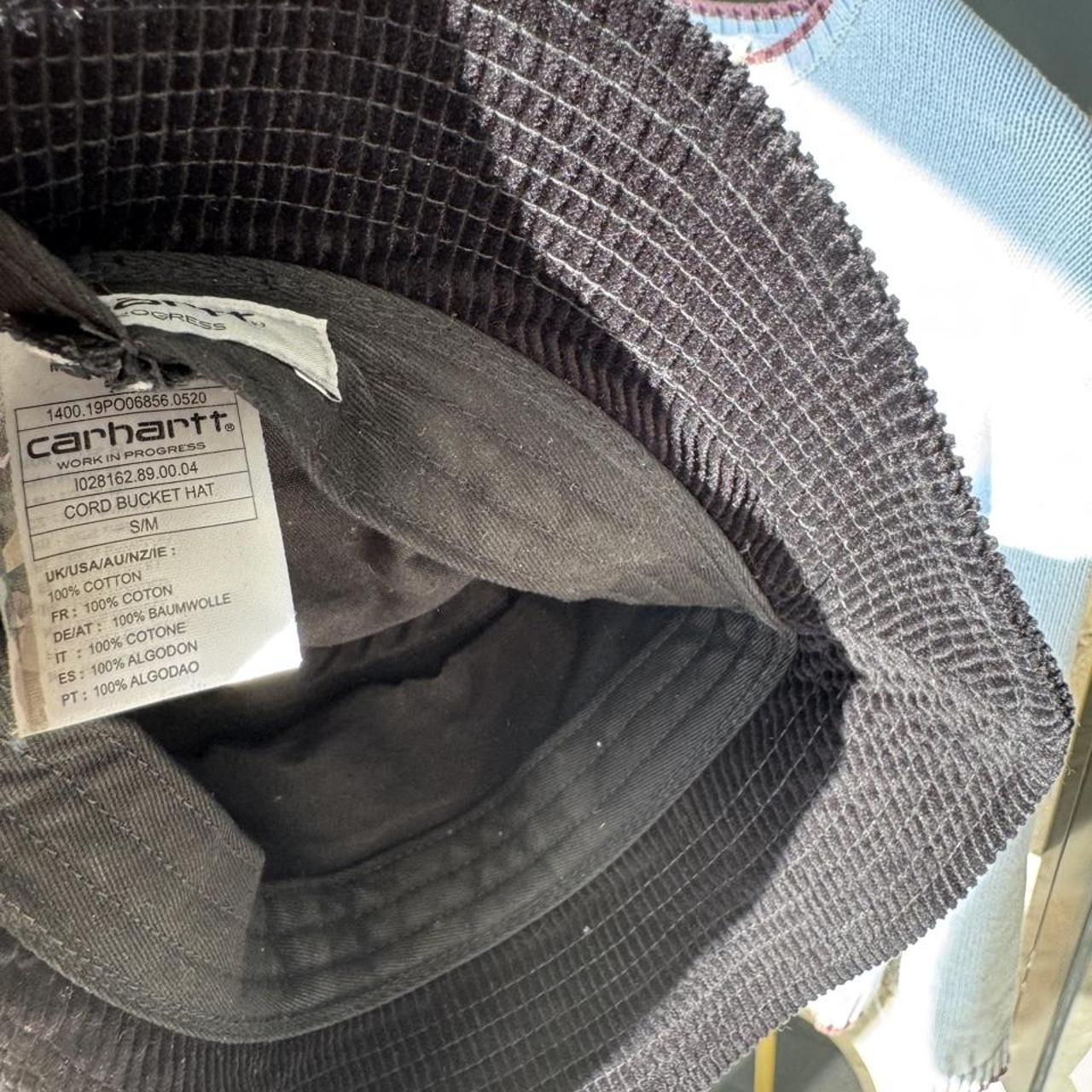 Carhartt WIP bucket hat brown corduroy with embroidered logo detail.