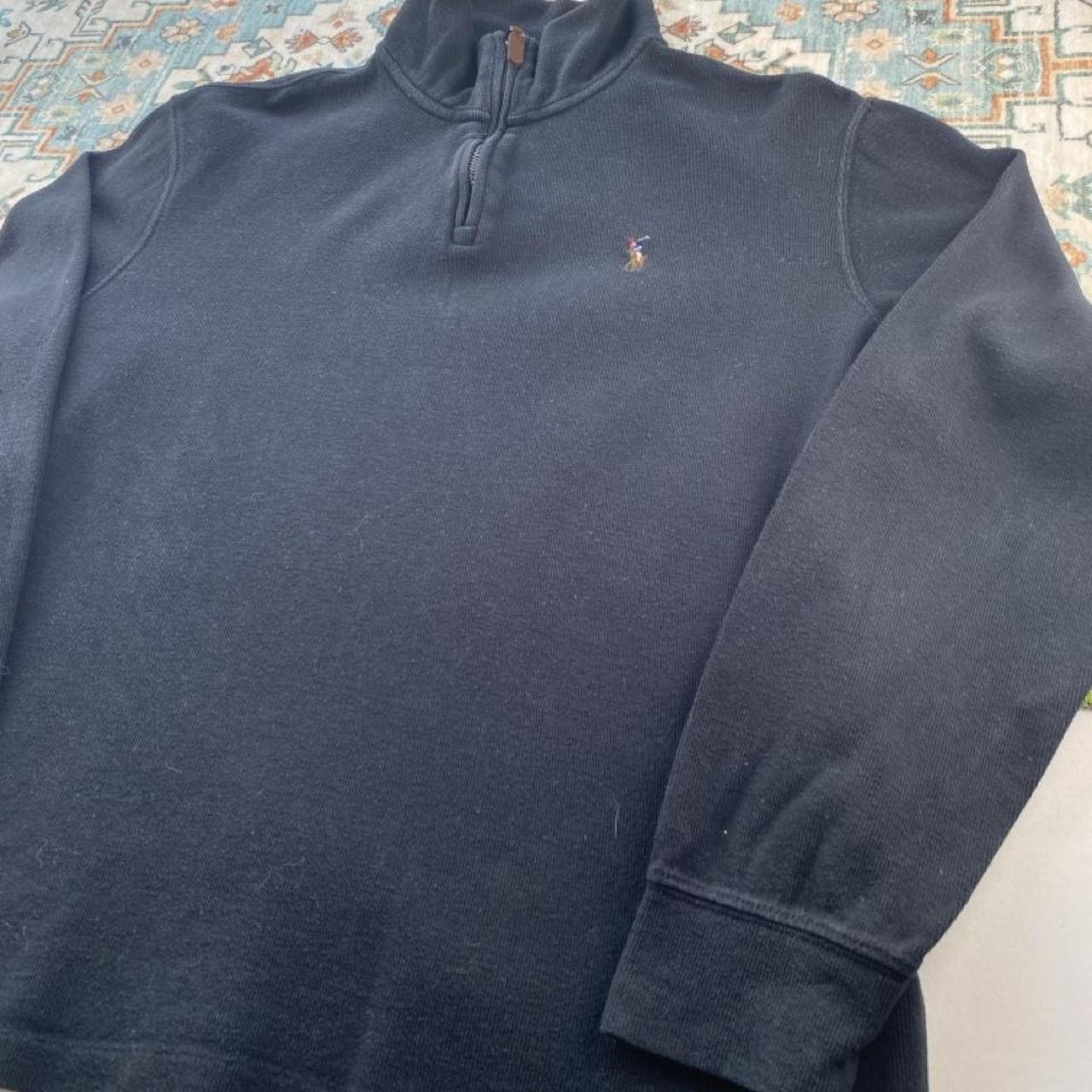 Polo Ralph Lauren black and brown quarter zip jumper with embroidered logo and soft fabric.