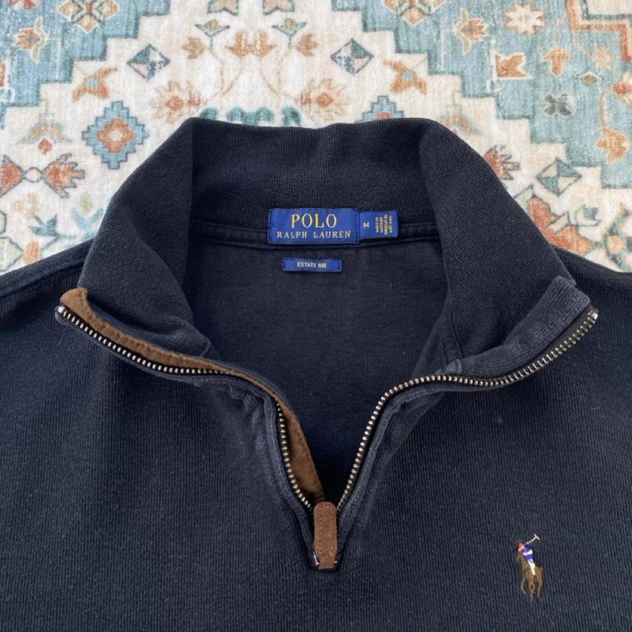 Polo Ralph Lauren black and brown quarter zip jumper with embroidered logo and soft fabric.