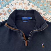 Polo Ralph Lauren black and brown quarter zip jumper with embroidered logo and soft fabric.