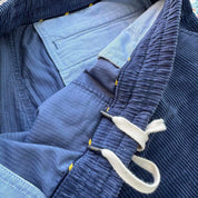 Polo Ralph Lauren navy corduroy shorts with embroidered logo and classic fit.
