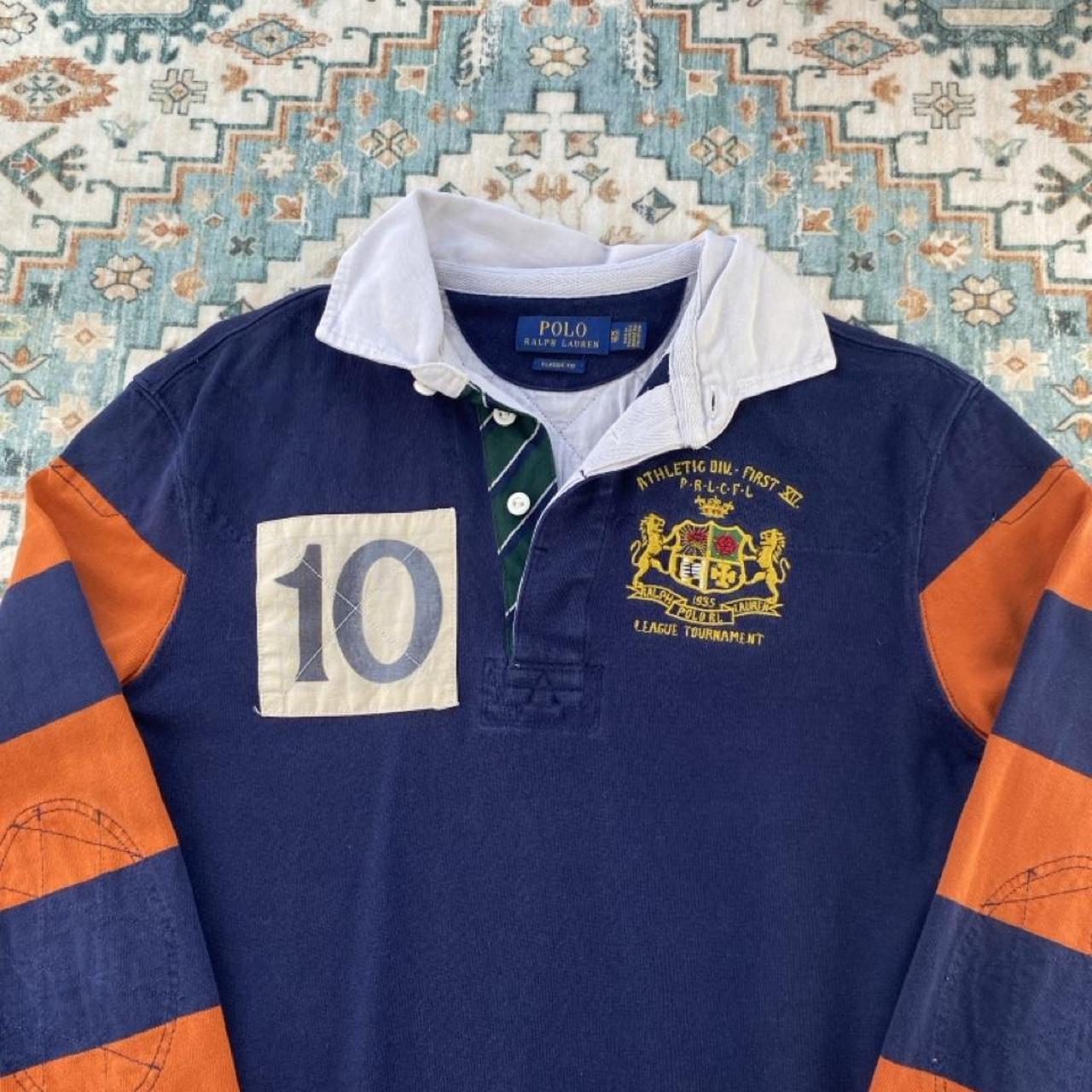 Polo Ralph Lauren oversized rugby polo shirt navy blue with embroidered logo and classic stripes.