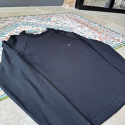 Yves Saint Laurent black knitted sweatshirt with embroidered YSL logo and slim fit.