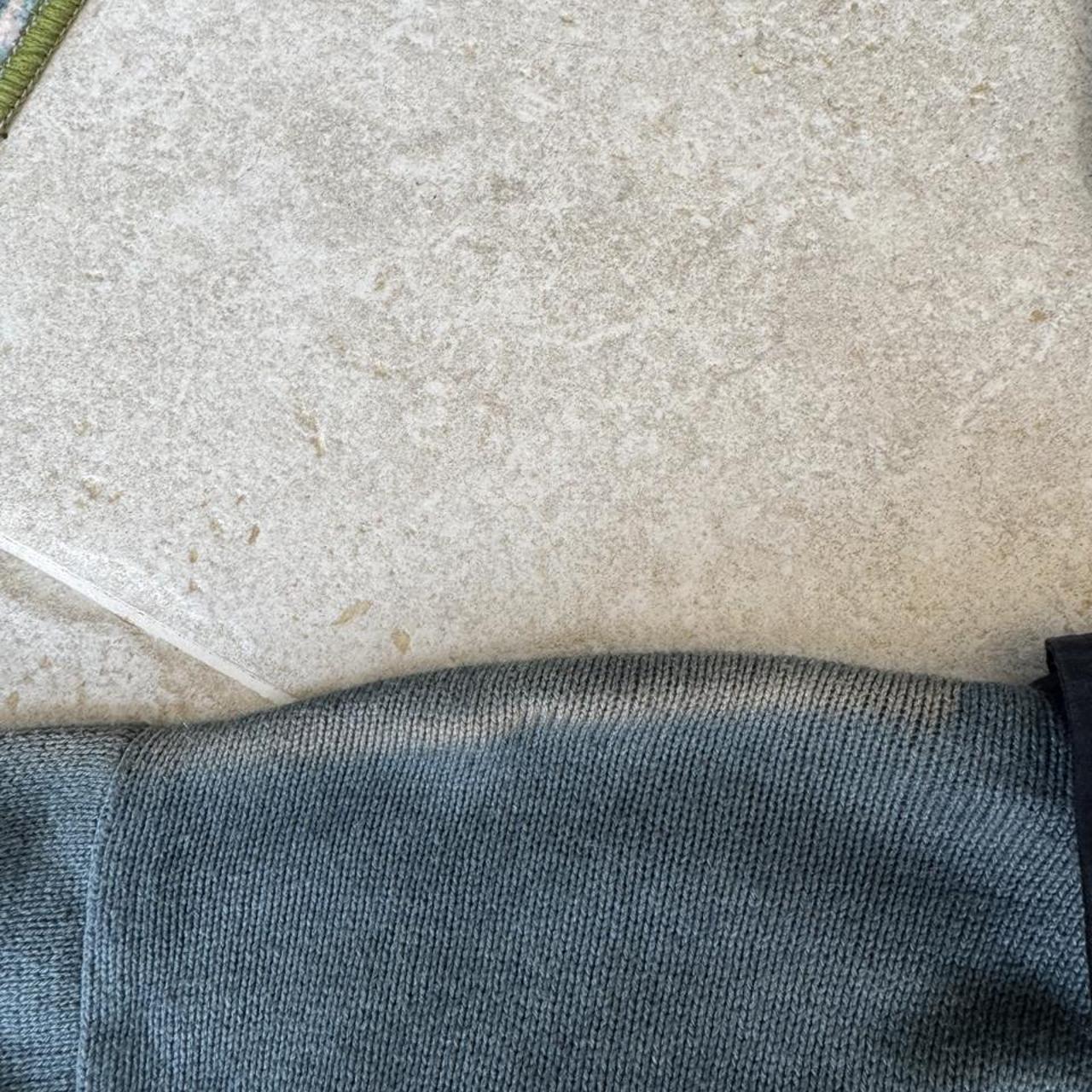 Burberry striped jumper small with embroidered logo and sun fading on shoulder.