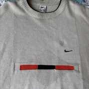 Nike cream knitted jumper with embroidered logo and visible marks from the 1990s.