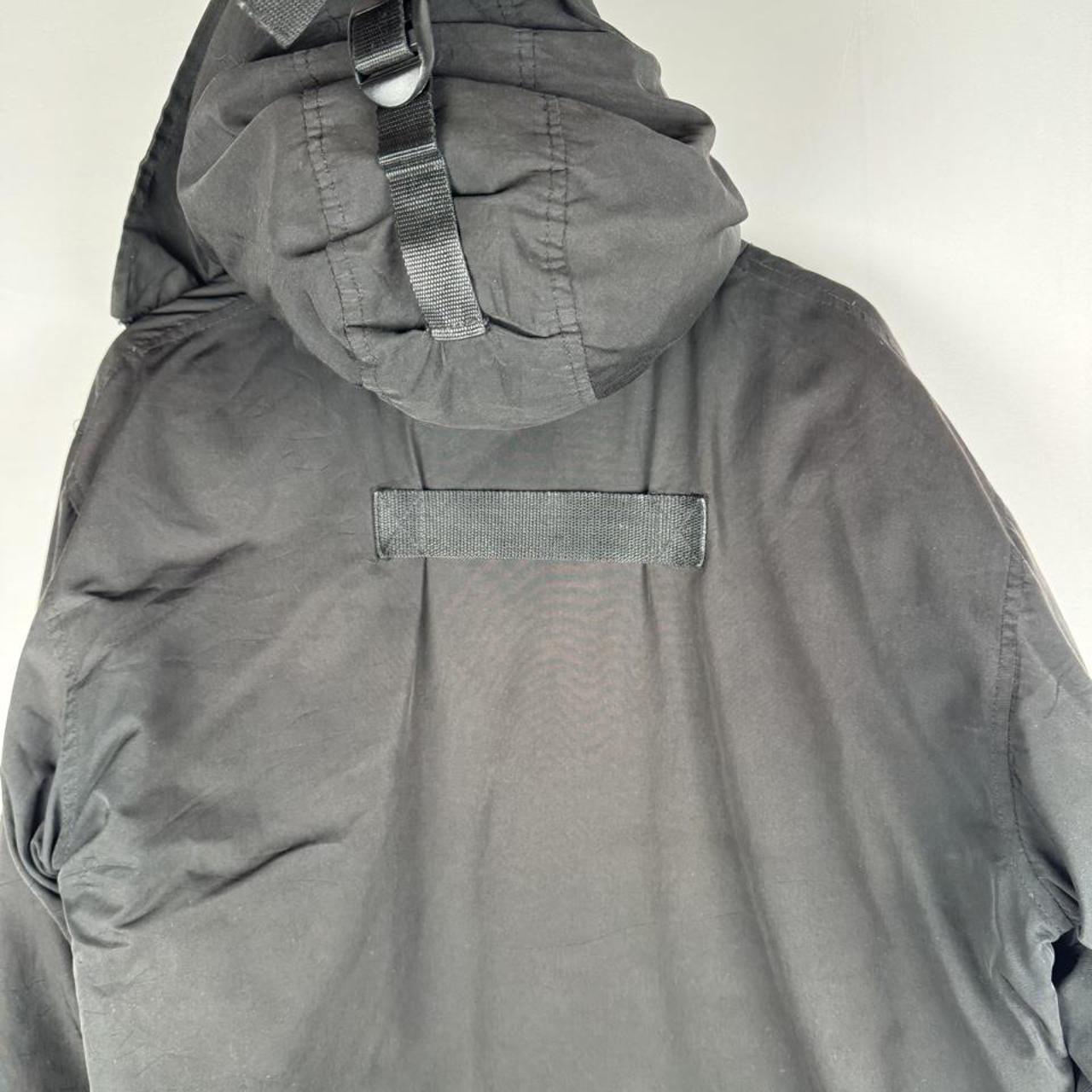 Canada Goose battered jacket black with no fur, badge, or visible holes.