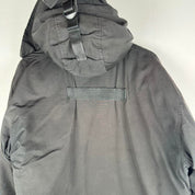 Canada Goose battered jacket black with no fur, badge, or visible holes.