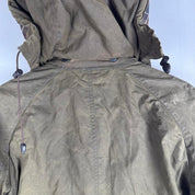 Barbour brown and green wax jacket with classic logo and durable material.