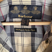 Barbour cream checkered parachute field jacket with relaxed fit and distinctive logo.