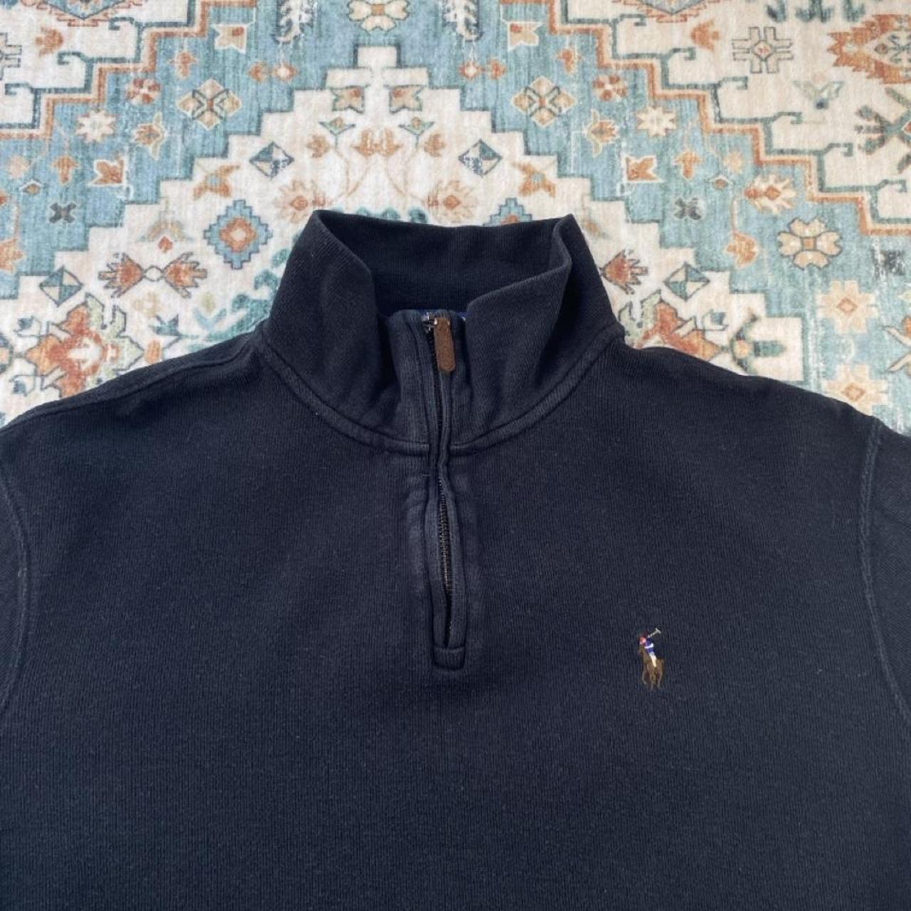 Polo Ralph Lauren black and brown quarter zip jumper with embroidered logo and soft fabric.