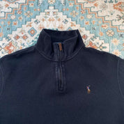 Polo Ralph Lauren black and brown quarter zip jumper with embroidered logo and soft fabric.
