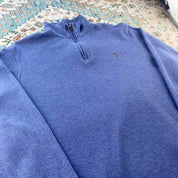 Polo Ralph Lauren light blue quarter zip fleece with embroidered logo and soft texture.