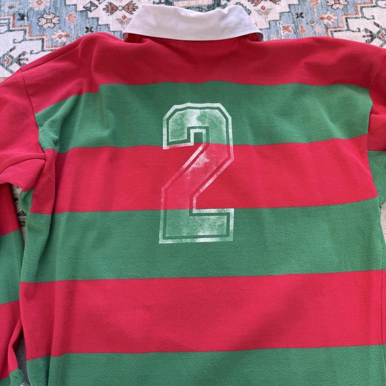 Canterbury men's rugby polo shirt red with embroidered Portugal logo and classic collar.