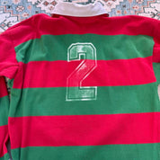 Canterbury men's rugby polo shirt red with embroidered Portugal logo and classic collar.