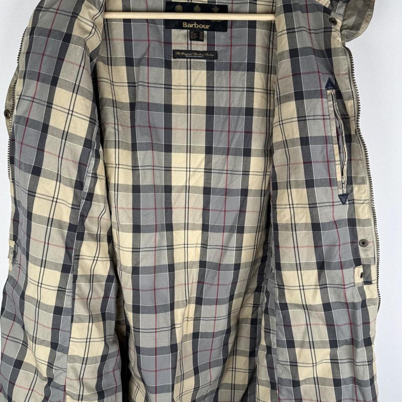 Barbour cream checkered parachute field jacket with relaxed fit and distinctive logo.