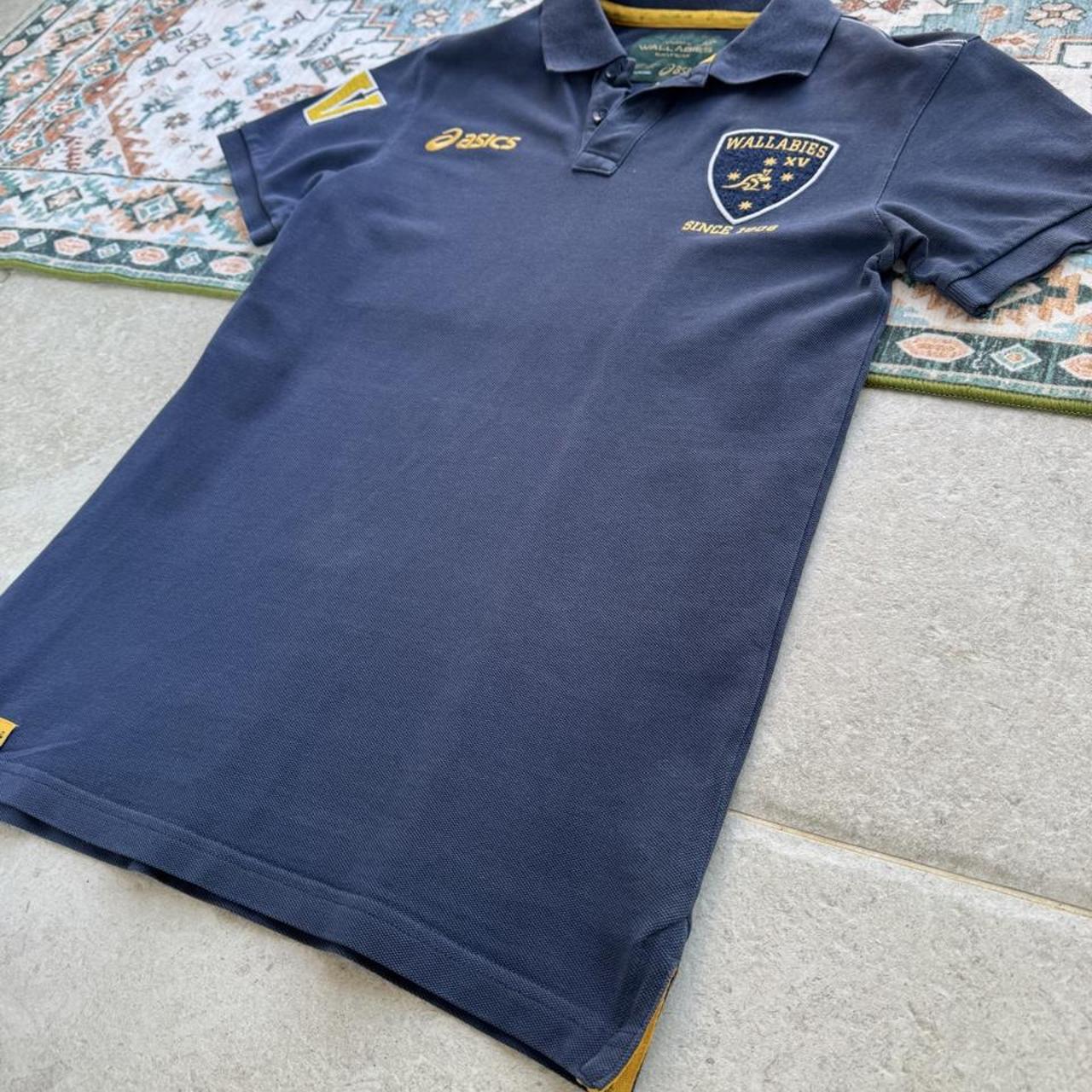ASICS Wallabies rugby polo shirt green with logo and slim fit design.