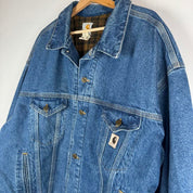 Carhartt denim trucker jacket 1990s style with classic logo and relaxed fit.