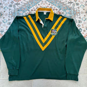 1990s Australia Wallabies rugby polo green with embroidered logo and classic collar.