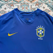 Nike blue Brazil away jersey with logo and classic design details.