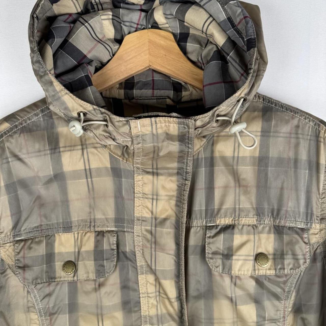 Barbour cream checkered parachute field jacket with relaxed fit and distinctive logo.