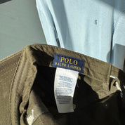 Polo Ralph Lauren khaki cap with embroidered pony logo and adjustable strap.