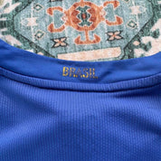 Nike blue Brazil away jersey with logo and classic design details.