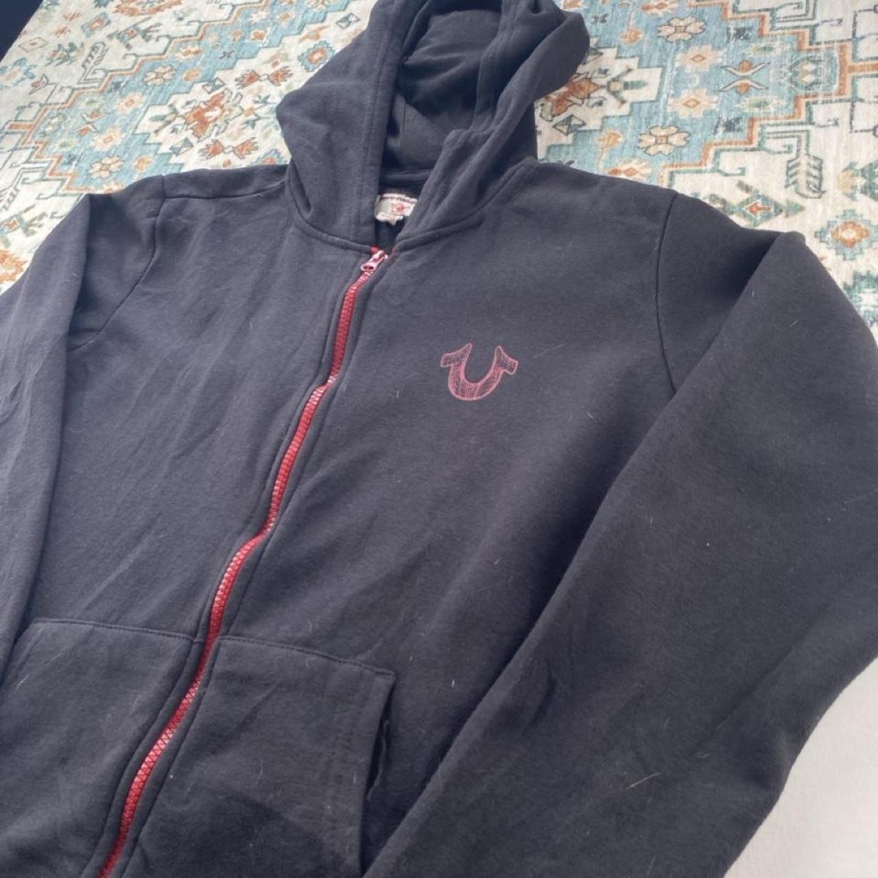 True Religion black full zip hoodie with logo detail and regular fit.
