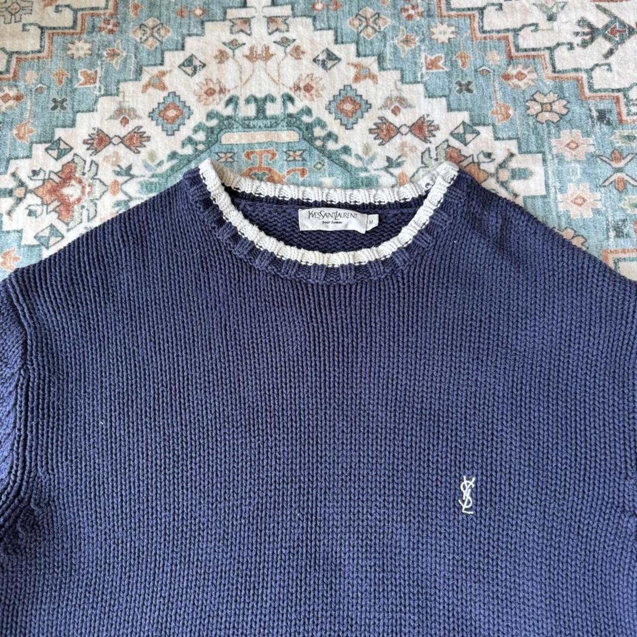 Yves Saint Laurent navy sweatshirt with white trim and embroidered YSL logo.