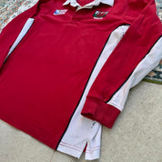 Wales red rugby polo shirt with embroidered logo and World Cup details.