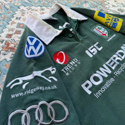 ISC green rugby polo shirt with embroidered London Irish logo and slim fit.