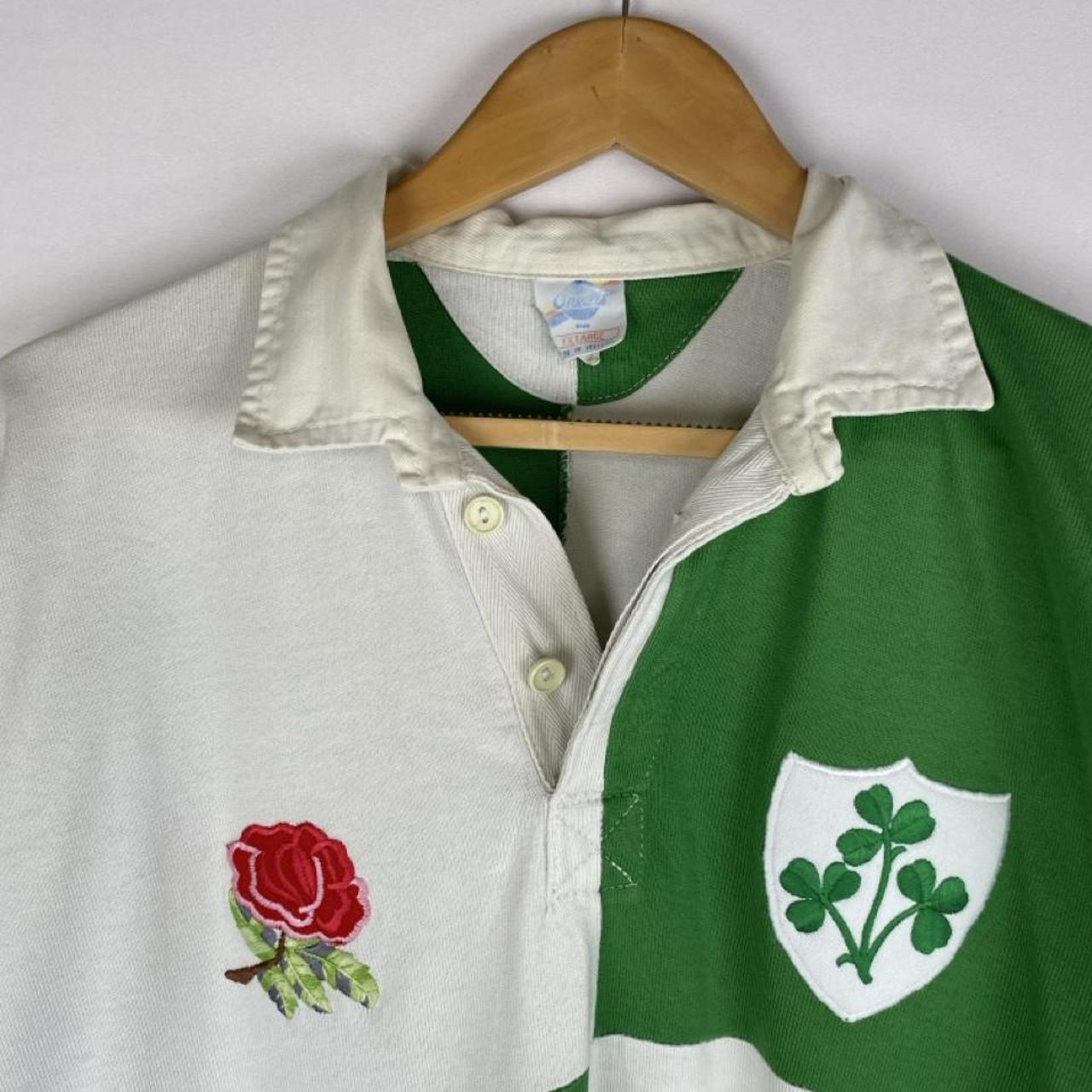 ONeills green and white checkered rugby polo shirt with vintage logo detail.
