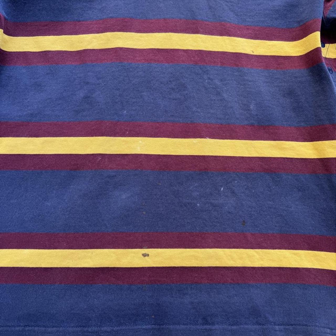 Polo Ralph Lauren burgundy and yellow short sleeve rugby polo with logo and collar details.