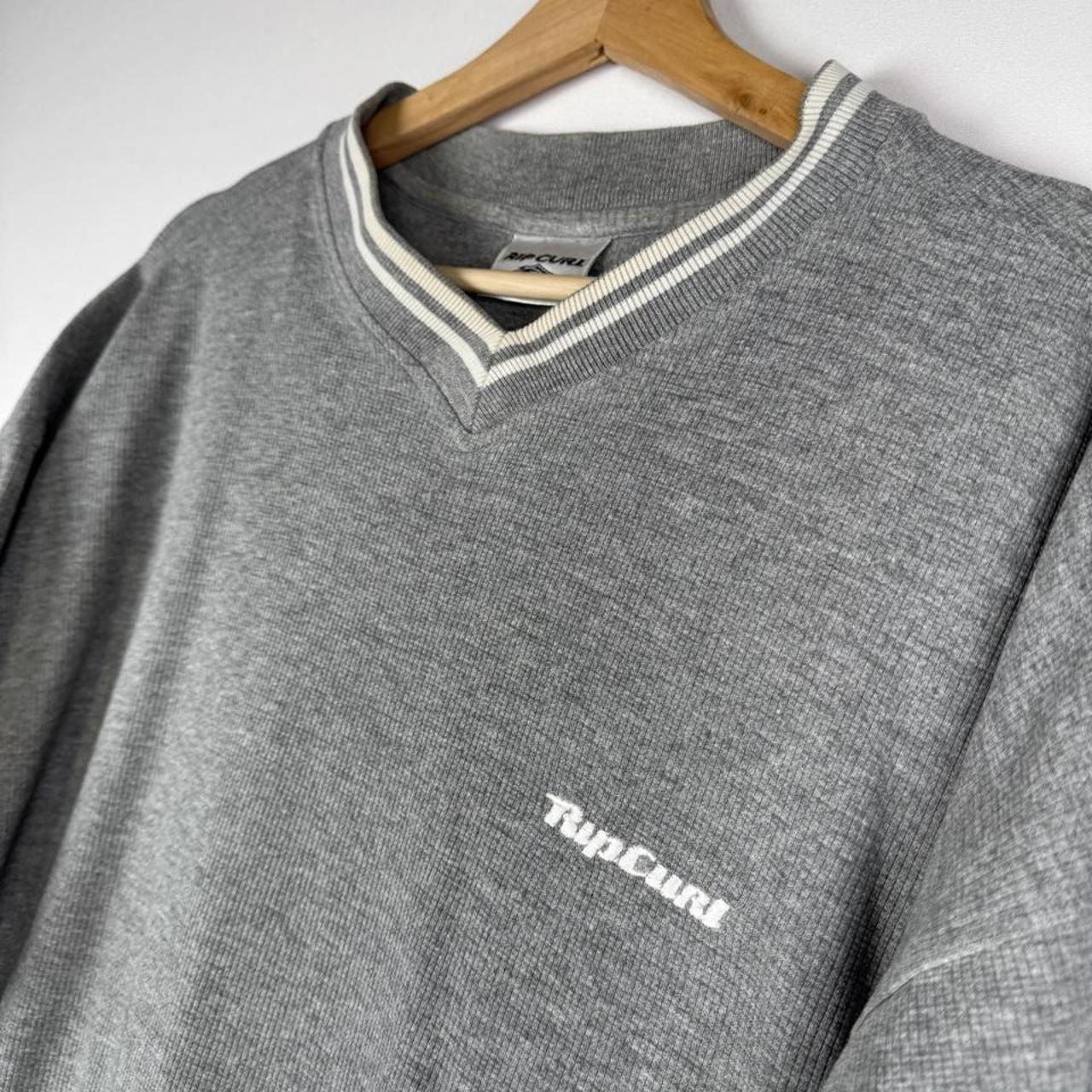 Rip Curl 1990s flannel t-shirt oversized XL, multicoloured spellout design.