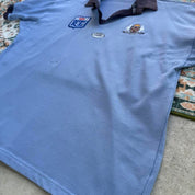 NSW Rugby League blue polo shirt with embroidered logo and vintage 1990s design.