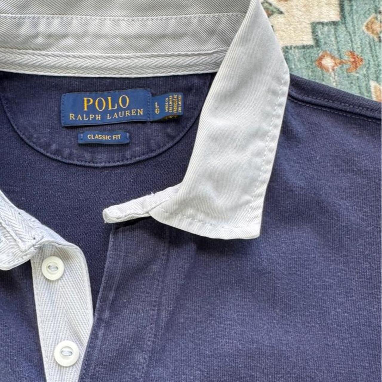 Polo Ralph Lauren navy rugby polo shirt with embroidered logo and thick fabric.