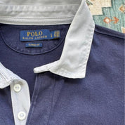Polo Ralph Lauren navy rugby polo shirt with embroidered logo and thick fabric.