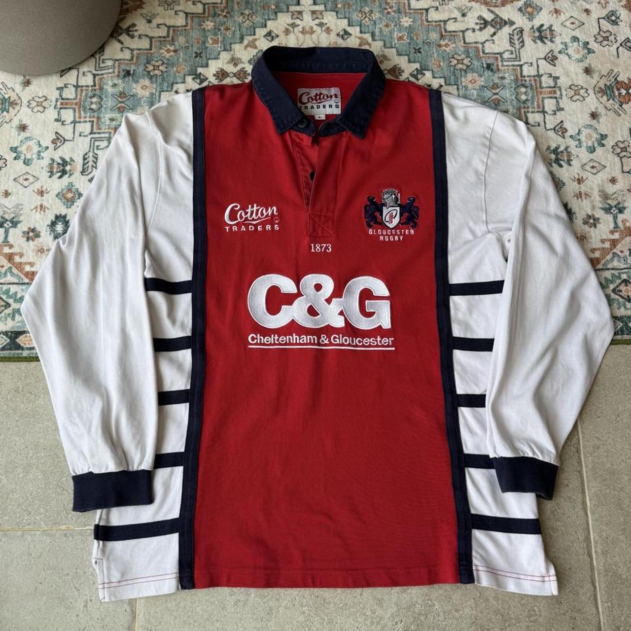 Cotton Traders long sleeve rugby polo shirt navy blue with embroidered logo and relaxed fit.