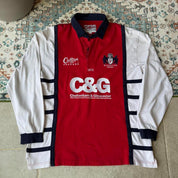 Cotton Traders long sleeve rugby polo shirt navy blue with embroidered logo and relaxed fit.