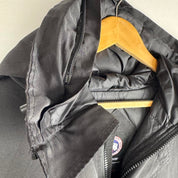 Canada Goose black parka jacket, missing fur trim, regular fit, size medium.