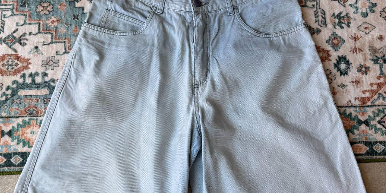 Quiksilver baby blue surf shorts 100% cotton with logo and classic design details.