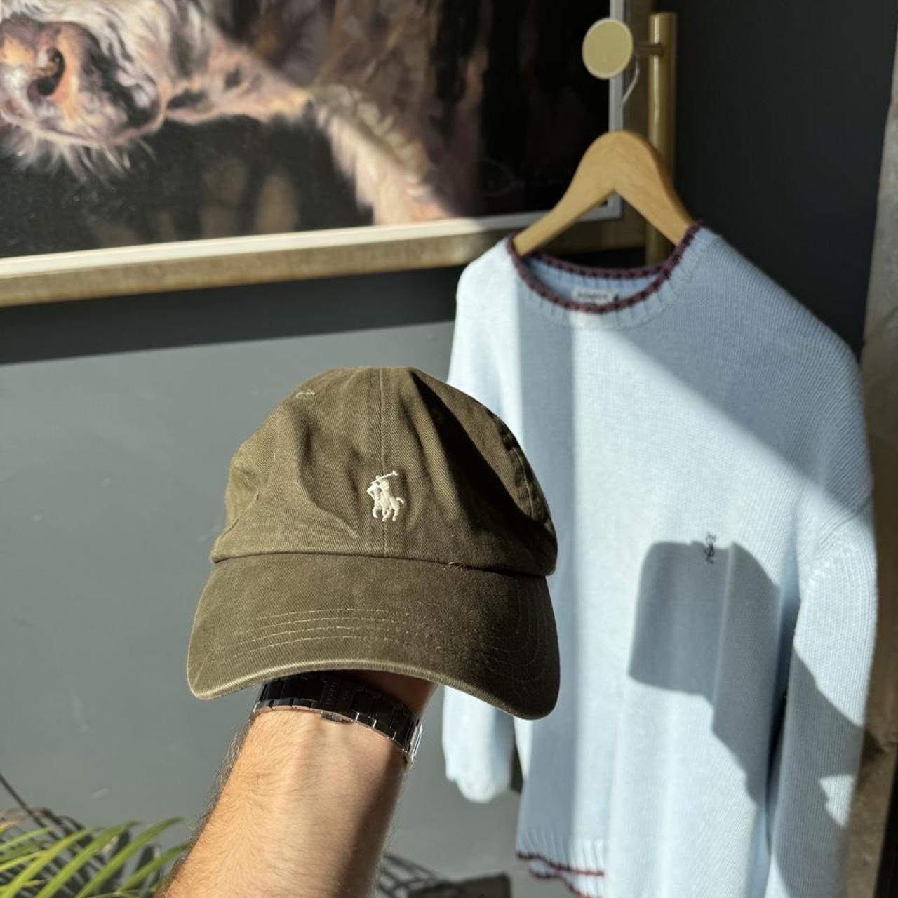 Polo Ralph Lauren khaki cap with embroidered pony logo and adjustable strap.