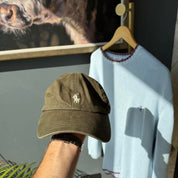 Polo Ralph Lauren khaki cap with embroidered pony logo and adjustable strap.
